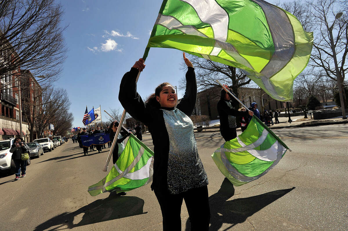 Danbury marching band color guard member Aysis Mack performs during the Greater Danbury Irish Cultural Center's St. Patrick's Day Parade in downtonw Danbury, Conn., on Sunday, March 22, 2015.