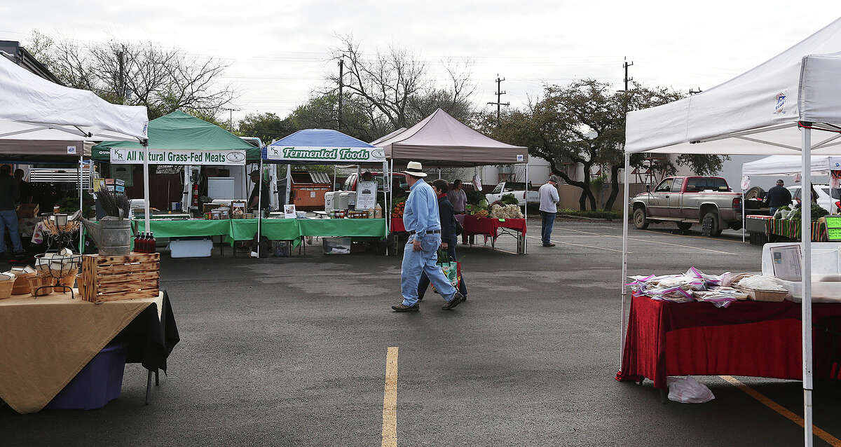 Early customers shop at the Yard Farmers and Ranchers Market on Sunday, March 22. Last week a controversy over racist remarks made by the market's owners led to at least six vendors leaving.