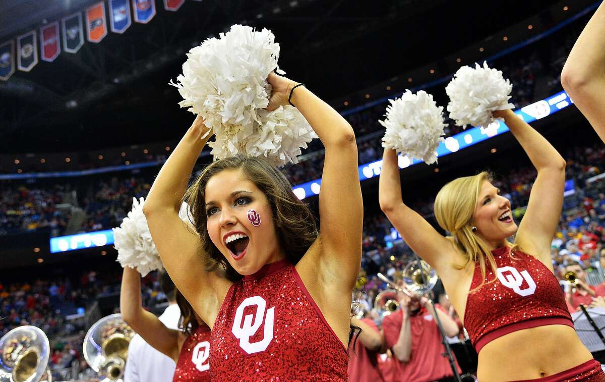 A Louisville cheerleader during the NCAA College Basketball game