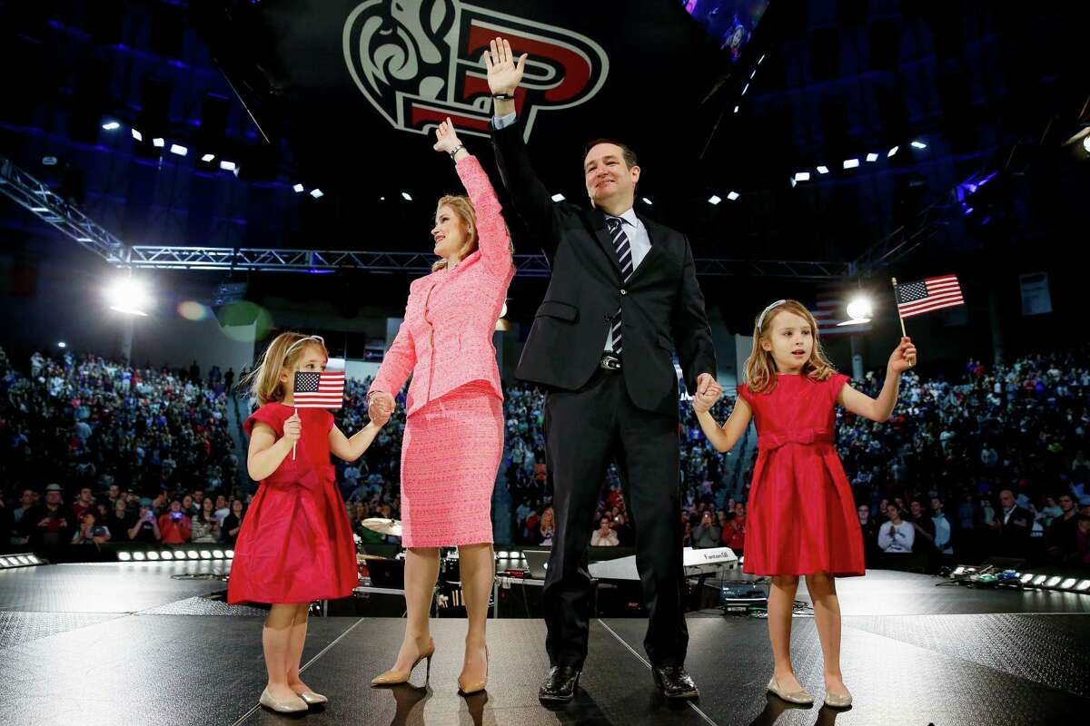 Sen. Ted Cruz, R-Texas, his wife Heidi, and their two daughters Catherine, 4, left, and Caroline, 6, right, wave on stage after he announced his campaign for president at Liberty University, in Lynchburg, Va. (AP Photo)