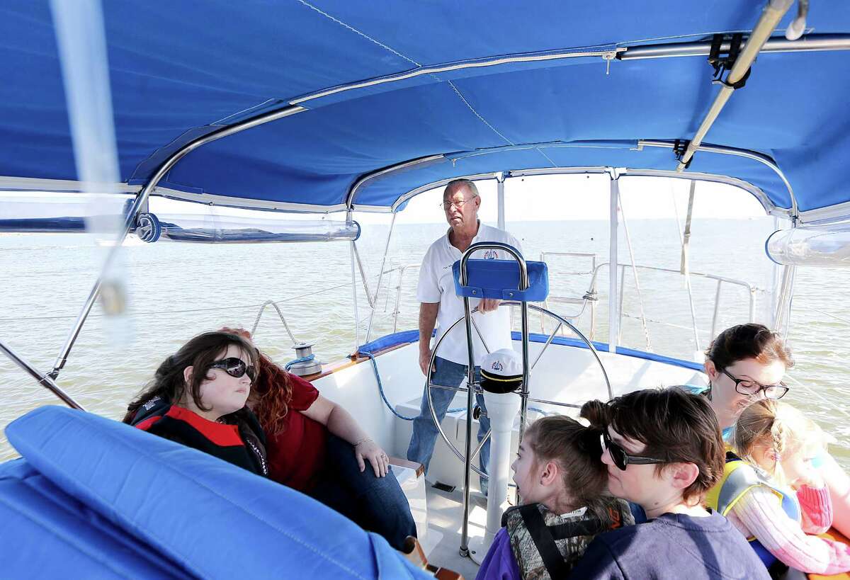 Dave McCabe takes children and veterans out on the water to work a