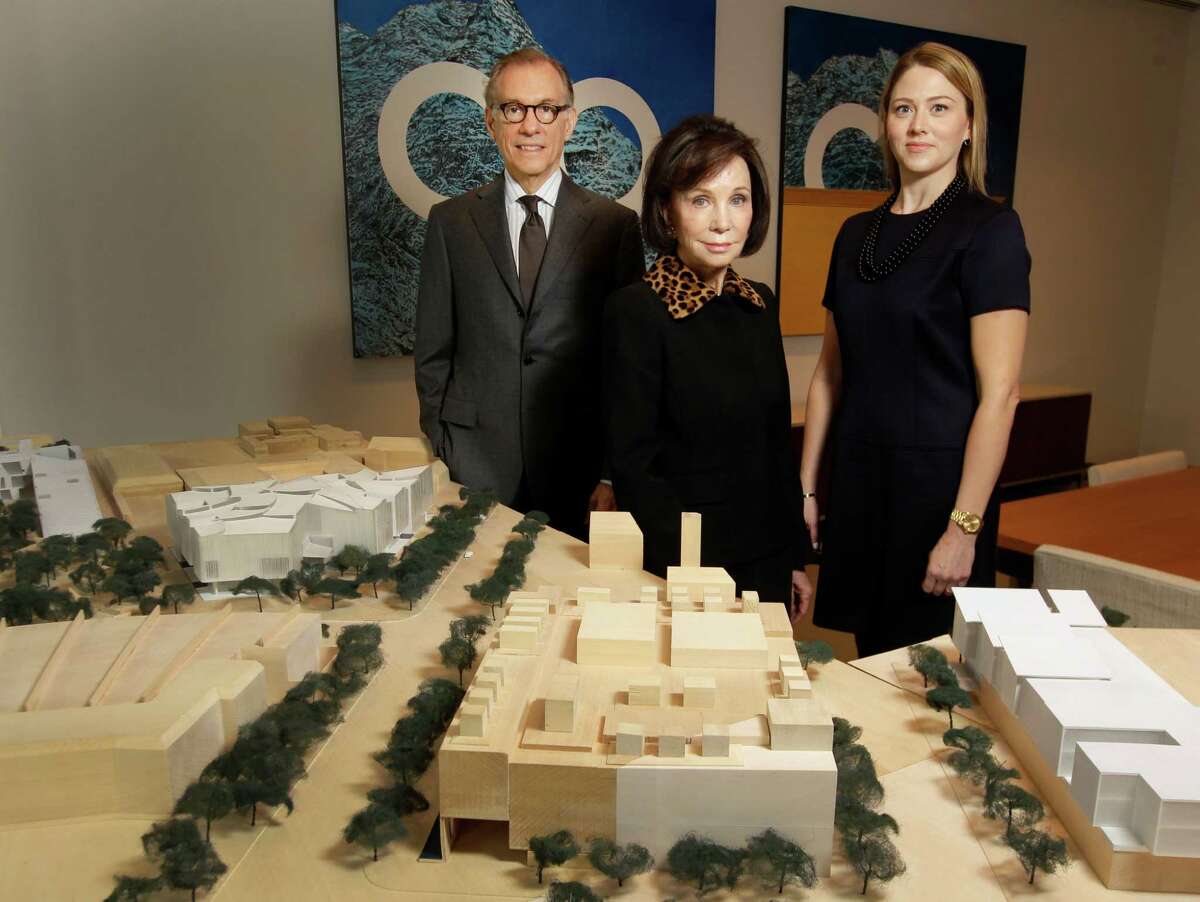 Gary Tinterow, from left, director of the Museum of Fine Arts, Houston; Cornelia Long, capital campaign chair; and Amy Purvis, development director, present a model showing the institution's campus expansion plan.