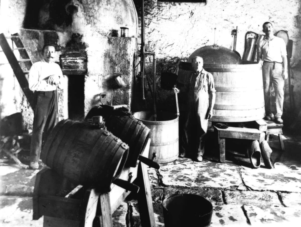 It all began with beer. A German immigrant named William A. Menger established San Antonio's first brewery with Charles Degen in 1855. They served beer to travelers in a tavern next to the Alamo Chapel. The interior of Degen's Brewery is shown in this 1904 photograph.