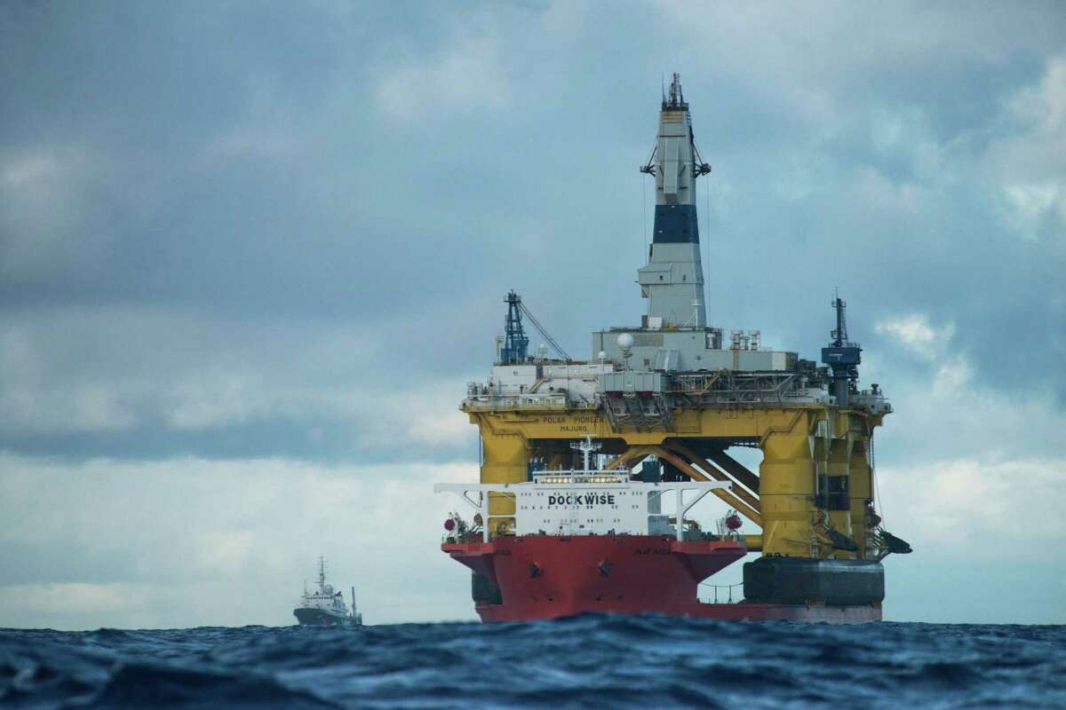 The heavy-lift vessel Blue Marlin transports Transocean's Polar Pioneer drilling rig, which Shell Oil Co. has contracted for 2015 exploration in the Chukchi Sea off Alaska. Greenpeace activists aboard the ice-class Esperanza tracked the Polar Pioneer during its trek in early 2015 across the Pacific to the Port of Seattle, where Shell planned to prepare it and other equipment for Arctic work. (Photo: Vincenzo Floramo / Greenpeace)