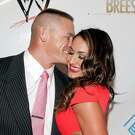 WWE Divas star Nikki Bella, with boyfriend John Cena, says she wants to be a wife and mother.