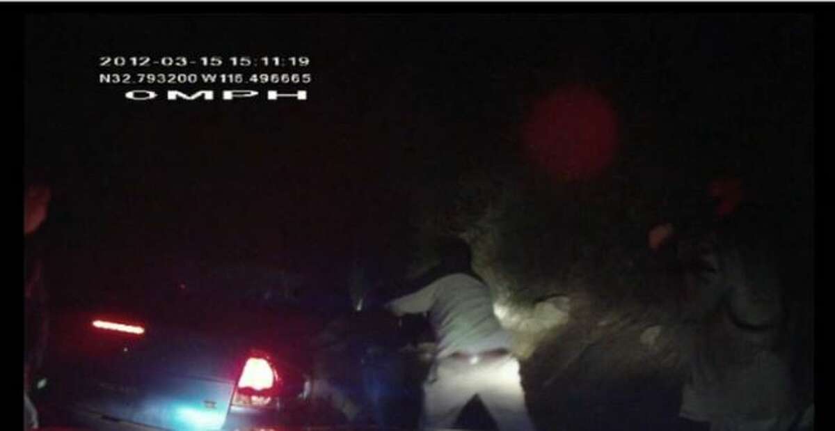 Border Patrol agents were involved in a high-speed pursuit that eventually led to an agent firing a Taser at the driver of the involved vehicle. An explosion occurred when the Taser was fired and the driver was burned to death. The dashcam video footage shows agents backing their vehicles away from the vehicle engulfed in flames.