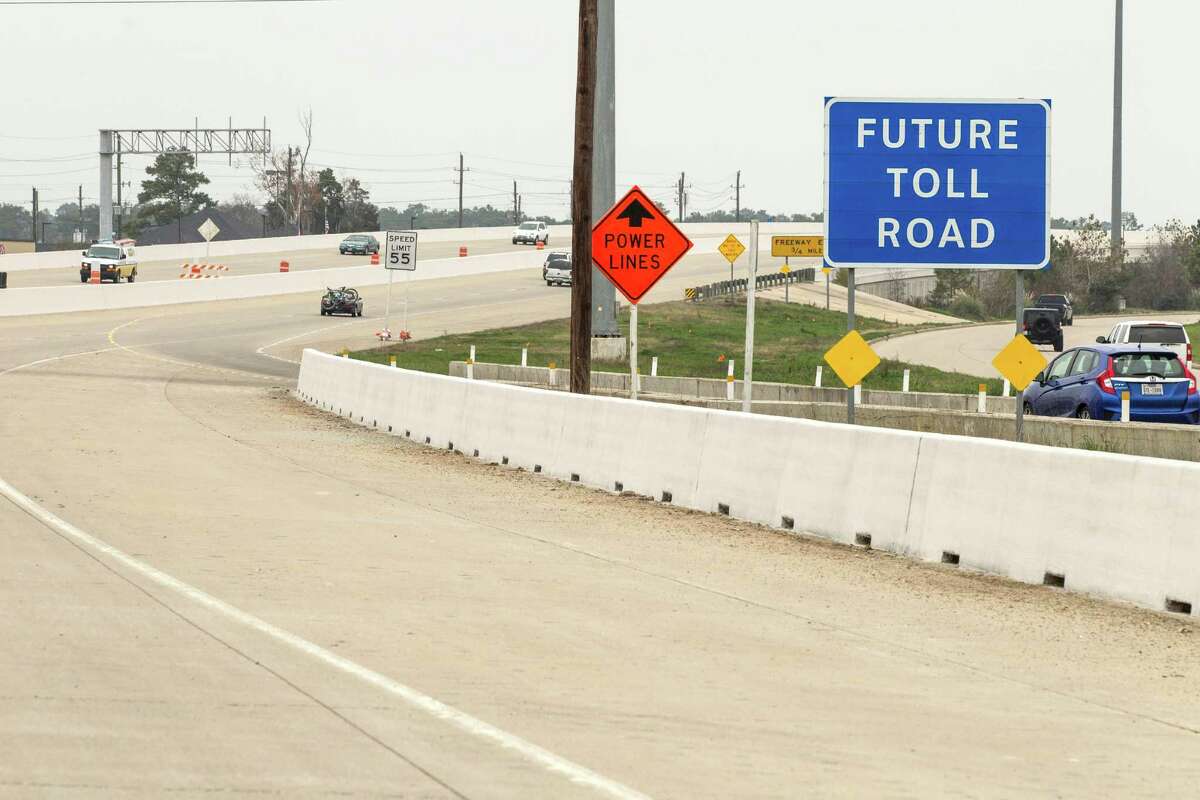 A "Future Toll Road" sign stands alongside Texas 249 as construction continued on the Tomball Tollway in February.