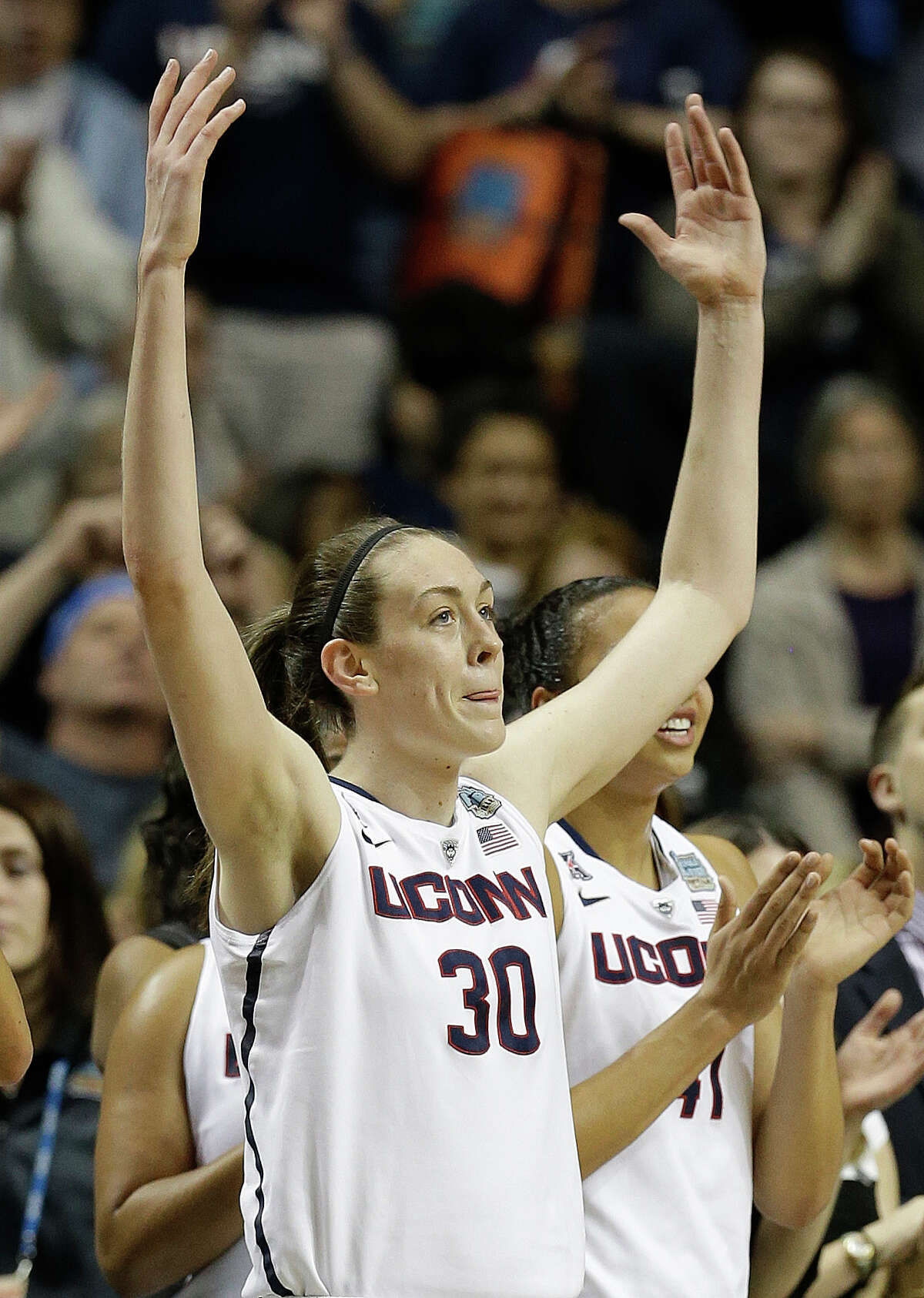 Connecticut forward Breanna Stewart (30) celebrates during the second half of the semifinal game against Stanford in the Final Four of the NCAA women's college basketball tournament, Sunday, April 6, 2014, in Nashville, Tenn. Connecticut won 75.56. (AP Photo/Mark Humphrey) ORG XMIT: TNMS194