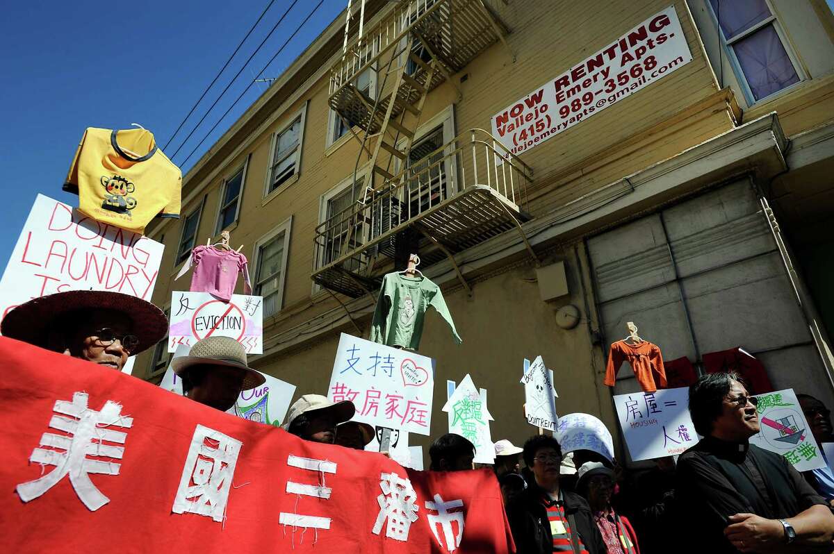 A sign advertising available rentals is seen as tenants and activists protest in front of the Vallejo Emery Apartments in Chinatown who's owner they say is trying to evict longtime residents so that the rooms can be rented to higher paying tech workers, in San Francisco, CA, on Thursday, March 26, 2015.