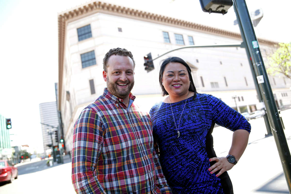 The Sears building in downtown Oakland, top, is being redesigned as a mix-use business space. The project is the brainchild of Loren Goodwin (left) and Ann Thai, above.