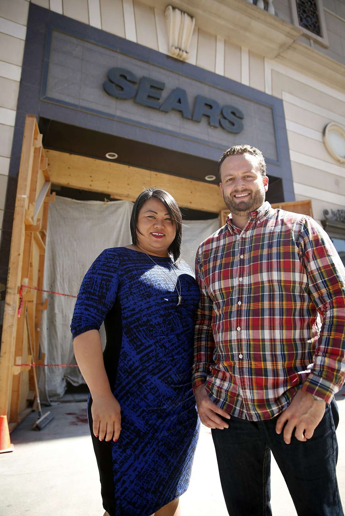 Uptown Station developers Ann Thai and Loren Goodwin in front of the historic Sears building on Telegraph Road in Oakland, Calif., on Thursday, March 26, 2015.