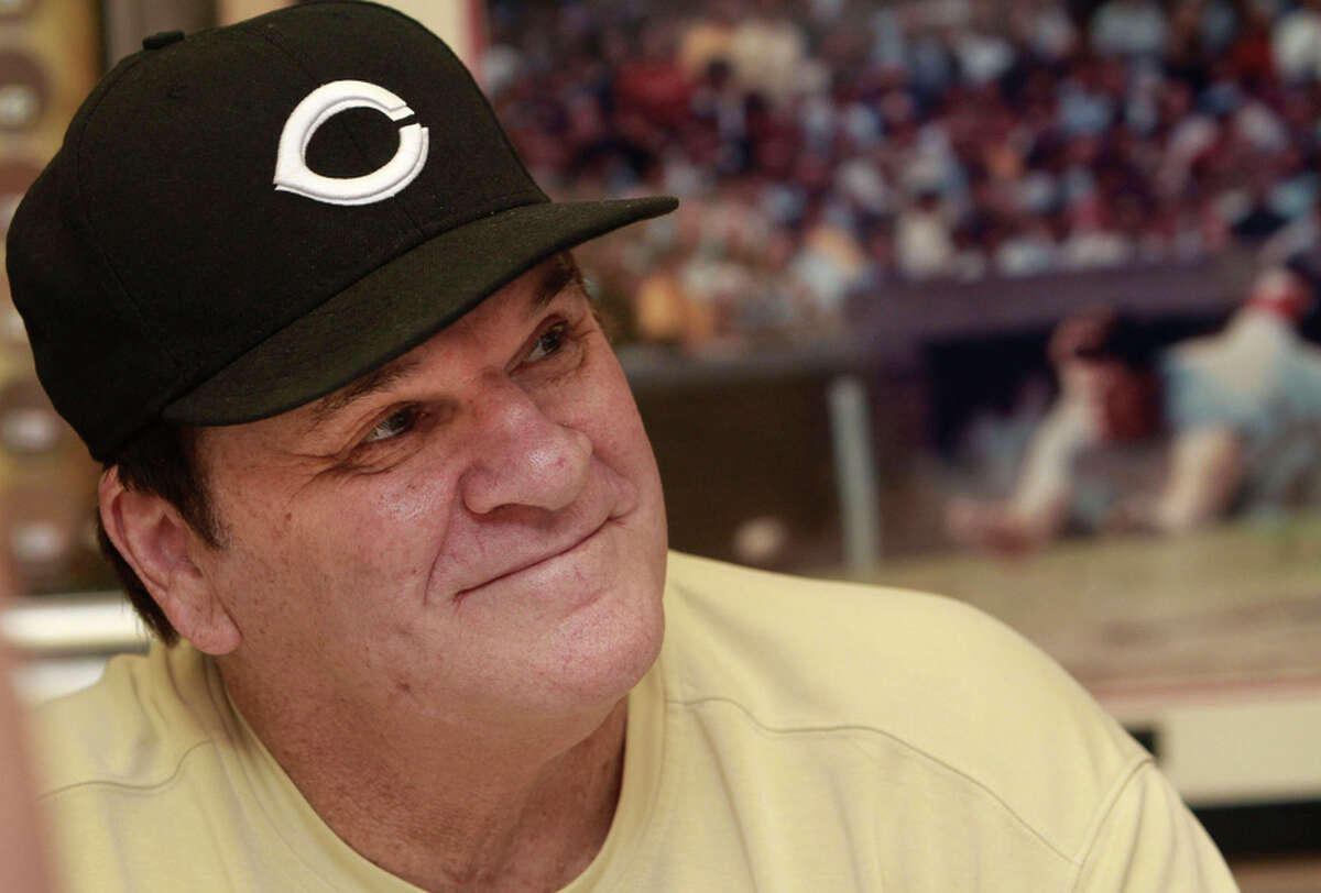 Pete Rose, who has submitted a new request to be reinstated to baseball, signs autographs at a mall in Indianapolis in 2011.