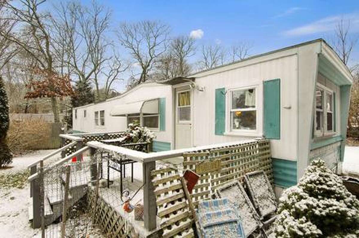 This rather rundown trailer house that sits in the middle of the posh Hamptons is listed for $1.2 million, up by $100,000 from last month. The house’s large price tag may leave people scratching their heads in confusion, but it’s location near the popular Indian Wells Beach actually makes it seem like a bargain. Next door, a home just sold for $4 million. Source: Douglas Elliman Real Estate