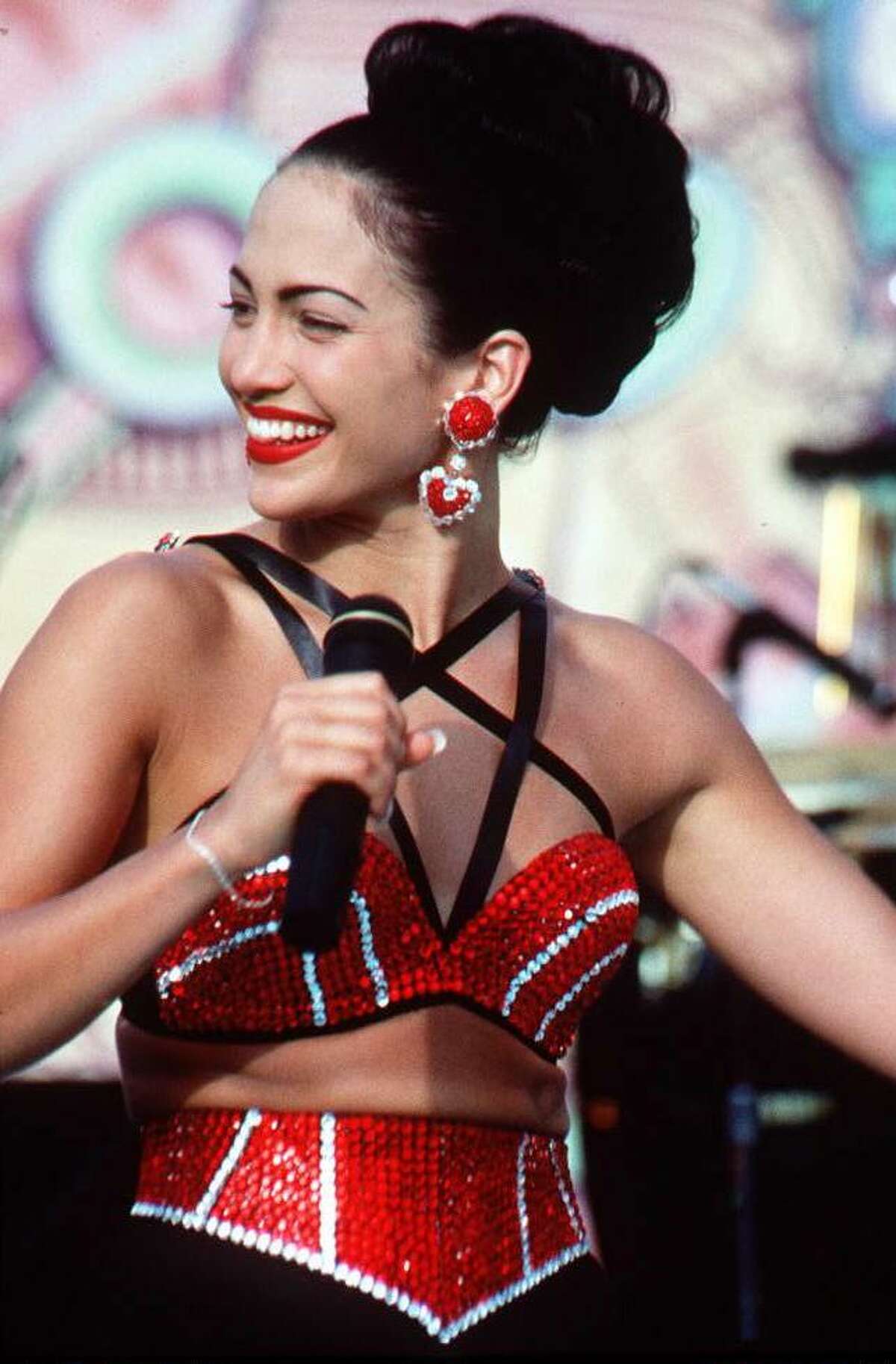 Actress Jennifer Lopez, who plays Selena in the movie "Selena," performs in one of the scenes from the movie. "Selena" is about the Tejano singer who is murdered by her fan club president.