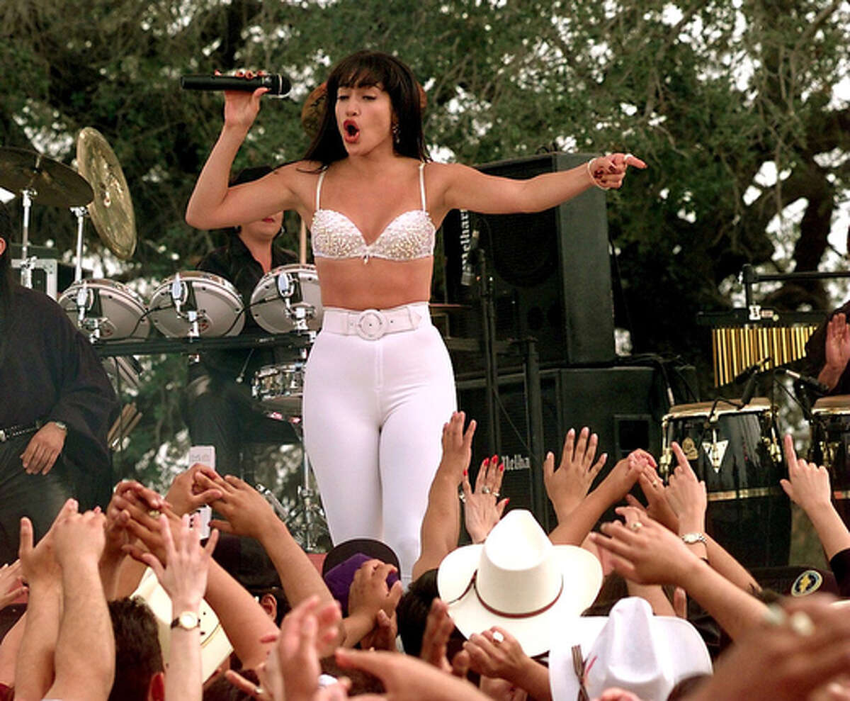 Jennifer Lopez playing Selena performs during the filming of the Monterrey concert scene in Poteet on Oct. 19, 1996. Area residents were used as extras for the crowd at the concert.