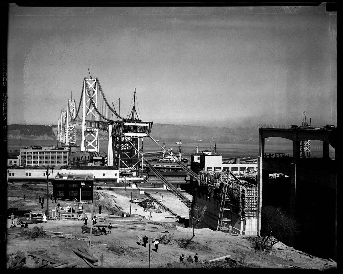 When it was built in the 1930s, the Bay Bridge was the longest span in the world. More than 8,300 men worked on the bridge, which opened Nov. 12, 1936.