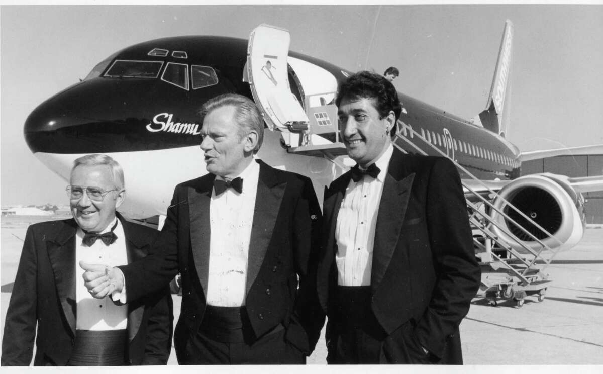 Left to right: George Becker (Sea World CEO), Herb Kelleher (Chairman of Southwest Airlines) and Mayor Henry Cisneros (May 1988)