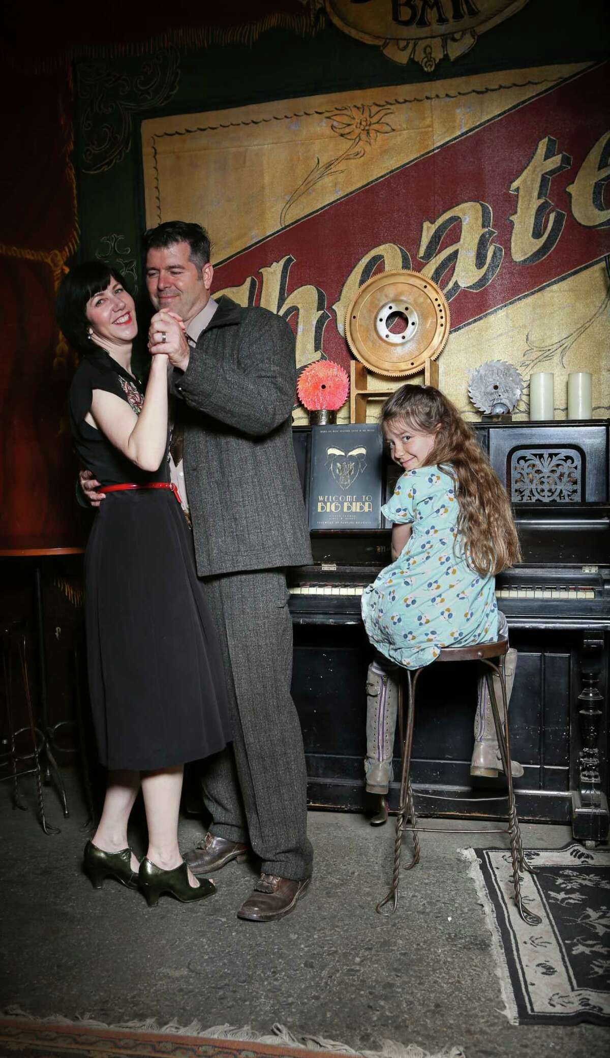 Stylish and artistic couple Kyrsten Mate and Jon Sarriugarte, with daughter Zolie, favor 1940s attire.