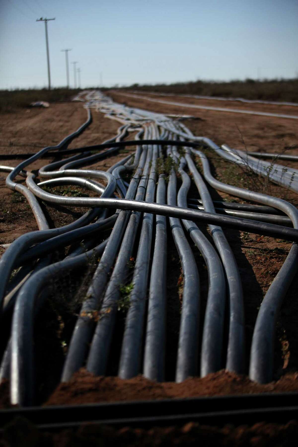 Oil from wells flows through pipelines to a storage facility on the Giddings Estate, near Midland. New lines out of the Permian have added more than 750,000 barrels a day of capacity, while output grew by only 400,000. With an outlet to Gulf Coast refineries, the Permian has been the only major U.S. shale region to keep growing as prices dropped by more than half to less than $50.