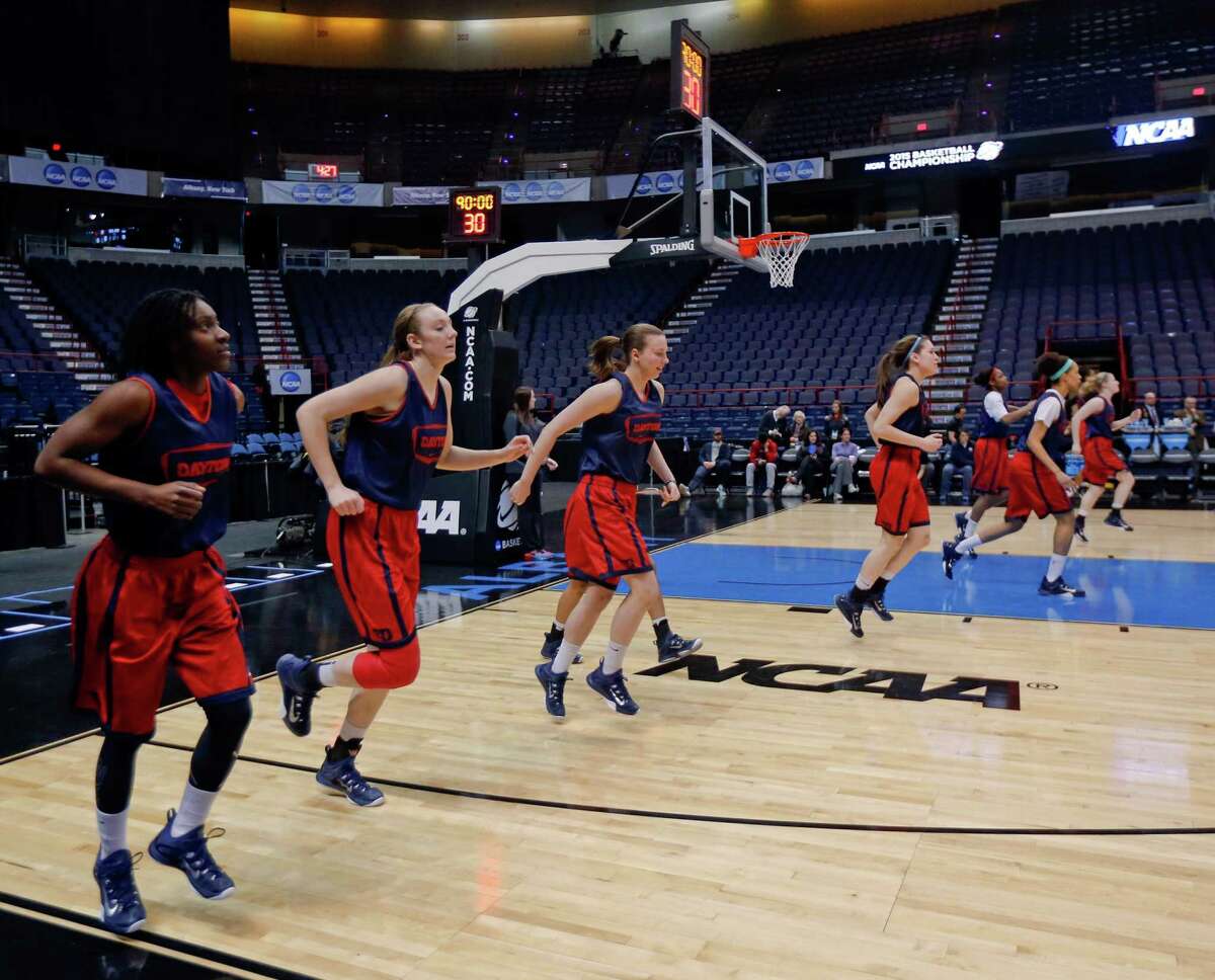 Dayton players warm up during practice for a women's college basketball regional semifinal game in the NCAA Tournament on Friday, March 27, 2015, in Albany, N.Y. Dayton plays Louisville on Saturday. (AP Photo/Mike Groll) ORG XMIT: NYMG139