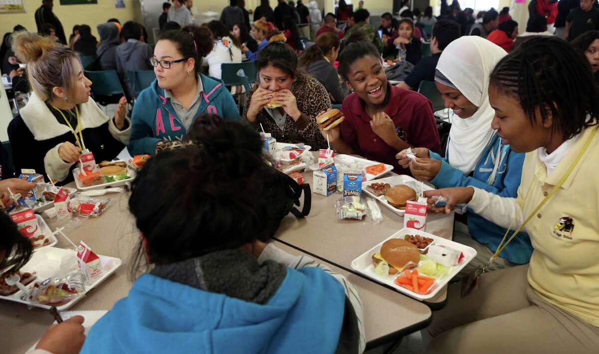 Teenagers from Cuba, Mexico, Nigeria, Ethiopia and Congo are among those who dine together at Lee High School.﻿
