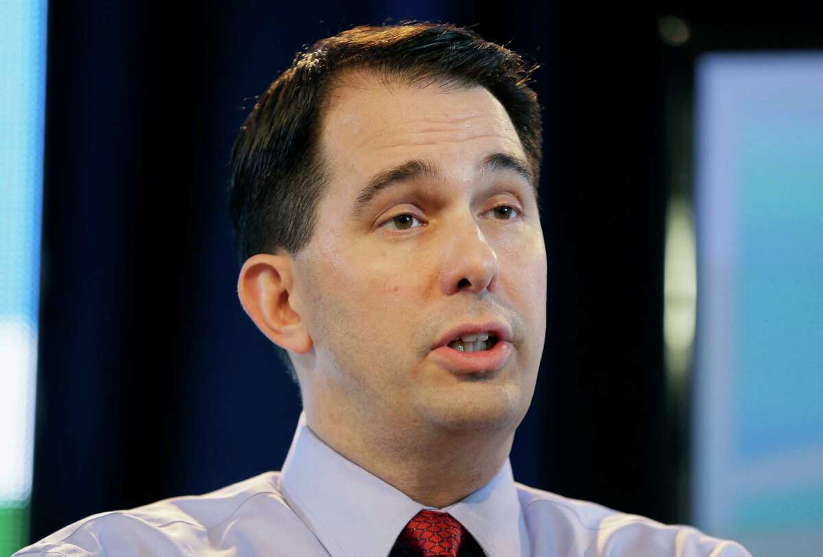 FILE - In this March 7, 2015 file photo, Wisconsin Gov. Scott Walker speaks in Des Moines, Iowa. ItÂ?’s become even clearer thanks to Wisconsin Gov. Scott Walker: Immigration is the banana peel of 2016 Republican presidential politics. Just ask Florida Sen. Marco Rubio. He stepped up as a Senate leader on immigration only to slip and fall in a tea party ruckus over the issue. In a moment of candor, he remembered the months of trying to get back up as Â?“a real trial for me.Â?” Former Florida Gov. Jeb Bush has a strong voice _ and a book _ on immigration but heÂ?’s done some shifting of his own. His statements in support of a path to legal status for people in the country illegally are loud and proud, but a departure from an earlier position that envisaged eventual citizenship. (AP Photo/Charlie Neibergall, File)