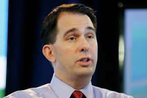 Wisconsin governor reiterates immigration stance at Houston stop