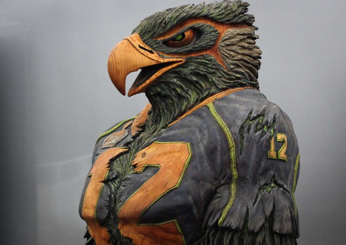 A wooden Seahawk, carved by Jacob Lucas, stood on display at the inaugural 12s Rally for 12s, a Seahawks rally and fundraiser at the Ballard Elks on Sunday March 29, 2015. Fans gathered to raise money for local charities and help 12 fan John Bachner, who was paralyzed last September in a car accident. (Daniella Beccaria, seattlepi.com)