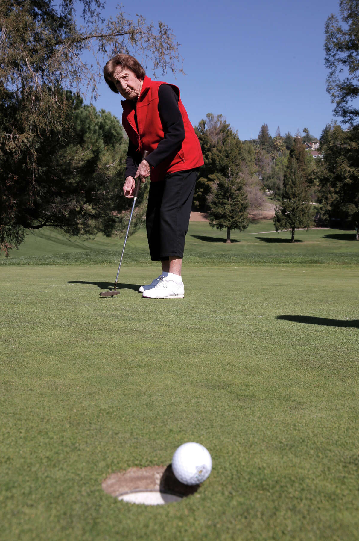 Ida Pieracci, putting at San Jose Country Club, gives new meaning to “breaking 100” on the course. At 103 — or maybe a mere 101 — she can look back on 11 holes-in-one.