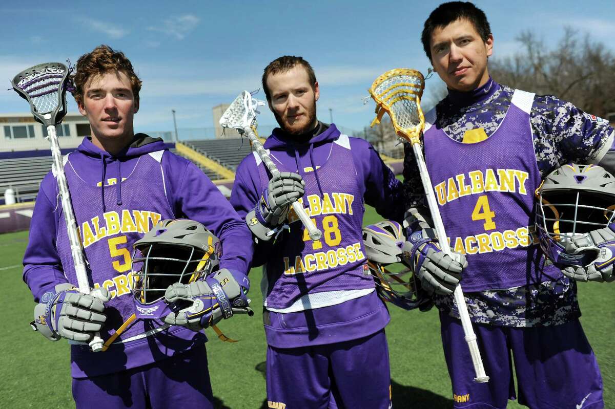 UAlbany's Connor Fields, left, Seth Oakes, center, and Lyle Thompson lead the highest-scoring team in college lacrosse on Wednesday, April 1, 2015, at UAlbany in Albany, N.Y. (Cindy Schultz / Times Union)