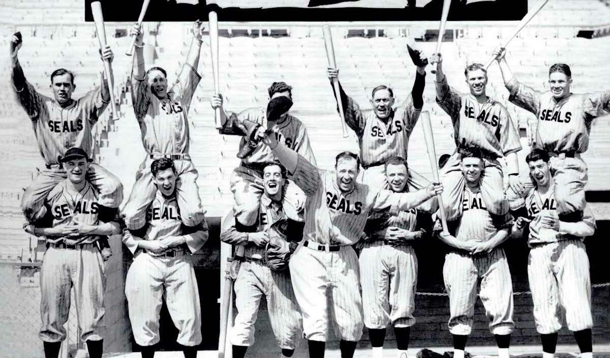 The 1935 PCL champion Seals included manager Lefty O’Doul (front) and Joe DiMaggio (lower right).