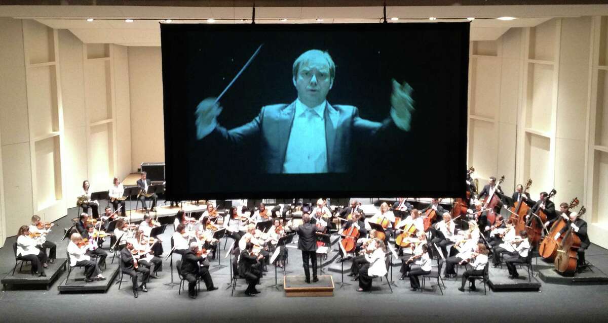 Live footage of San Antonio Symphony Music Director Sebastian Lang-Lessing and the musicians is beamed onto a screen during Discover concerts.