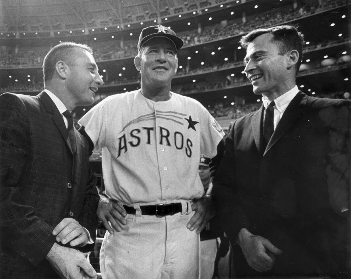 April 12, 1965: Twenty-two NASA astronauts throw ceremonial first pitches for the Astros’ first regular-season game at the Dome, a 2-0 loss to the Phillies.