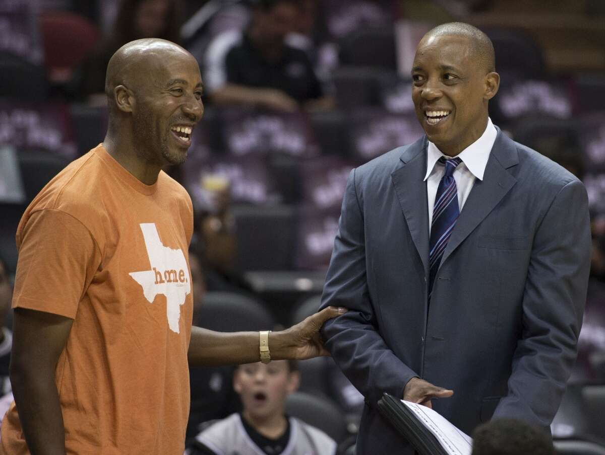 As part of a new video series called "Spurs Voices," former San Antonio Spurs player Sean Elliott shared a message about a time when he was called a racial slur while golfing with former teammate Bruce Bowen in San Antonio. In the photo,  Bowen, left, and Sean Elliott speak before an NBA game against the Denver Nuggets on Friday, April 3, 2015, in San Antonio.