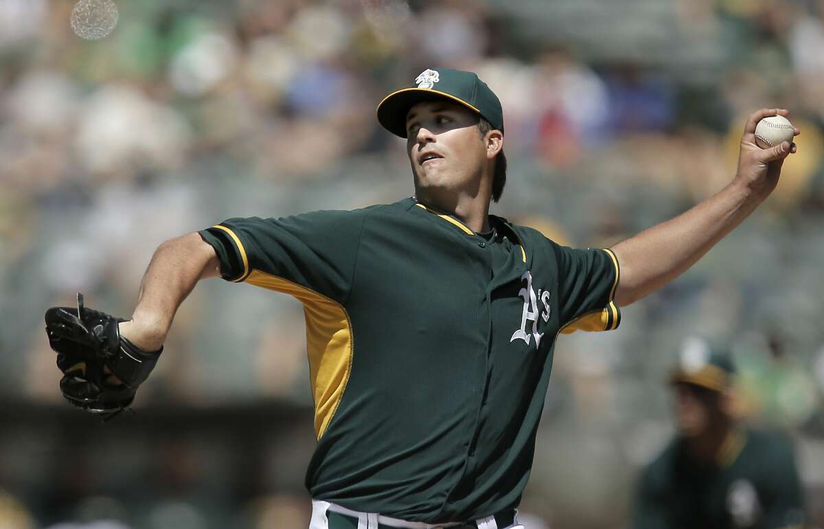 A's starting pitcher Drew Pomeranz, throws in the first inning, as the Oakland Athletics take on the San Francisco Giants in of game three of the Bay Bridge Series at O.co Coliseum in Oakland, Calif., as seen on Sat.. April 4, 2015.