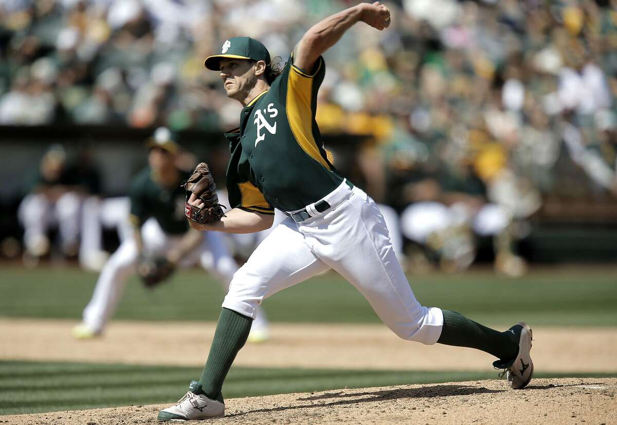 A's pitcher Barry Zito, throws in the 6th inning as the Oakland Athletics went on to lose to the San Francisco Giants 2-1 in game three of the Bay Bridge Series at O.co Coliseum in Oakland, Calif., as seen on Sat.. April 4, 2015.