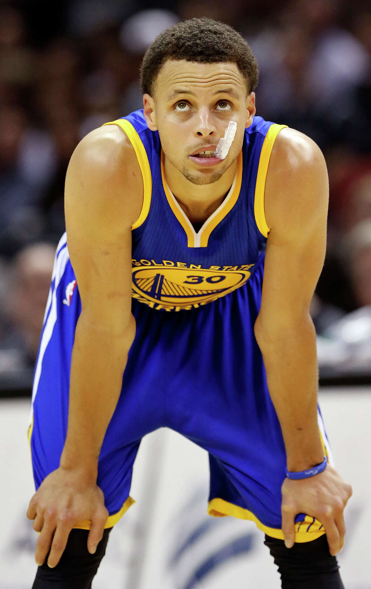 Golden State Warriors’ Stephen Curry pauses during second half action against the Spurs on April 5, 2015 at the AT&T Center.