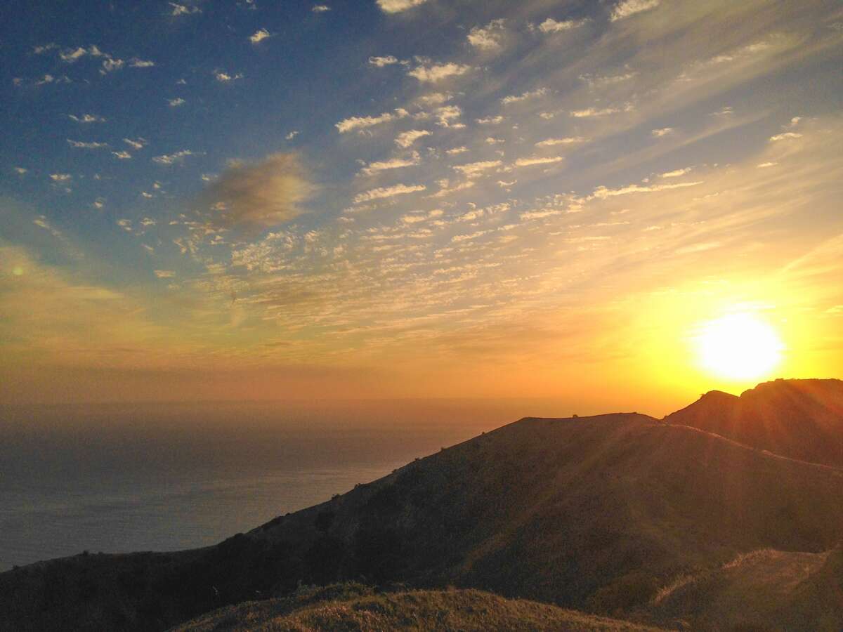 Pictured is the sunset atop the 2,000-foot mountain where Brooks Garner proposed to Erica Harness over the weekend.