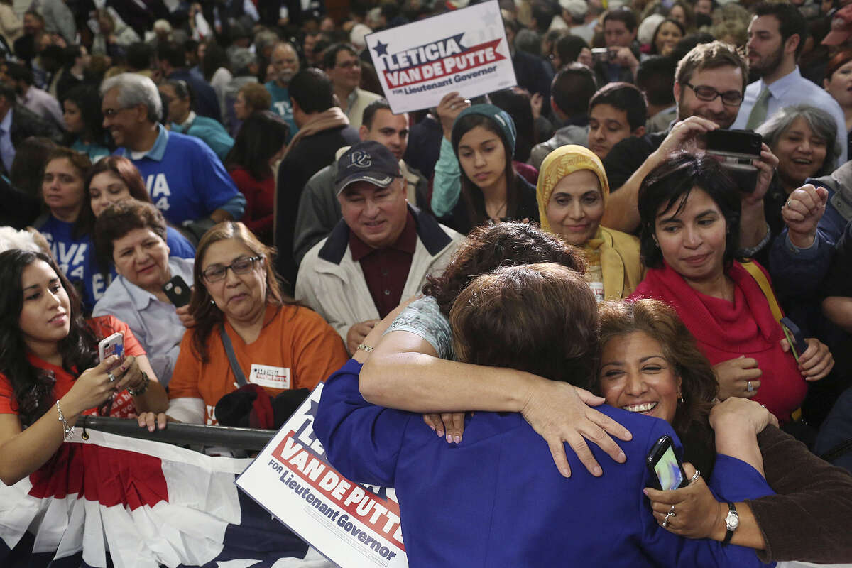 Low Texas turnout in November among Latinos likely was a factor in the losses by statewide candidate, including state Sen. Leticia Van de Putte, D-San Antonio, who was running for lieutenant governor. Here, she is embraced by Cynthia Esquivel, left, and Veronica Martinez, right, as she talks with supporters after announcing her run for that office at San Antonio College in 2013.