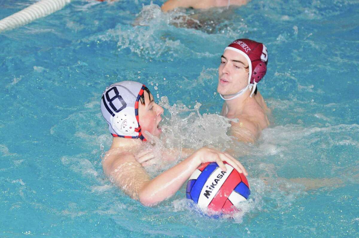 Lamar's Tyler Hanis (18 at left) and the Texans are hoping to secure another TISCA Water Polo State Tournament berth.