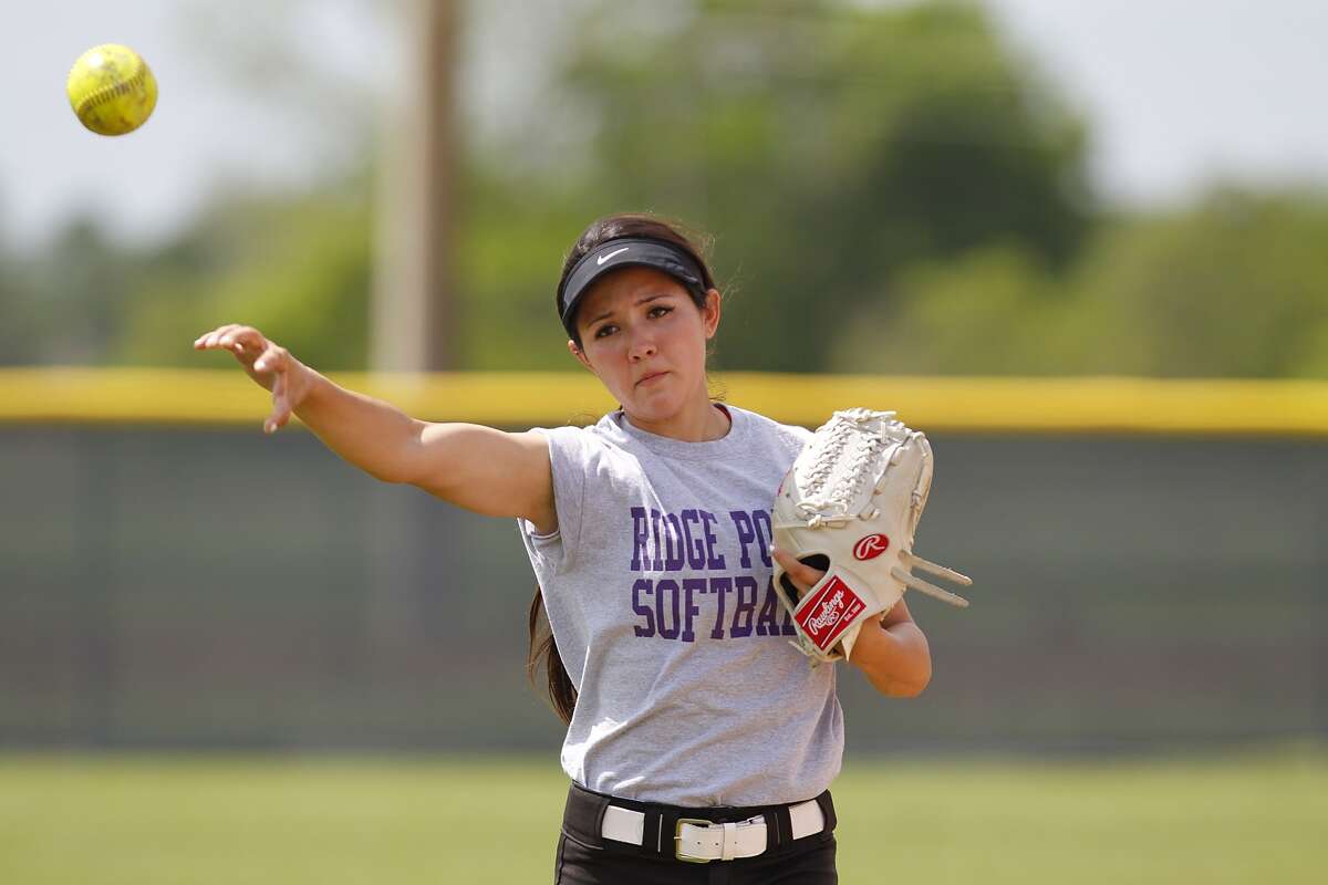 Ridge Point's Leeanne Thompson goes through throwing drills at the Panther's afternoon practice at Ridge Point High School on April 6, 2015.