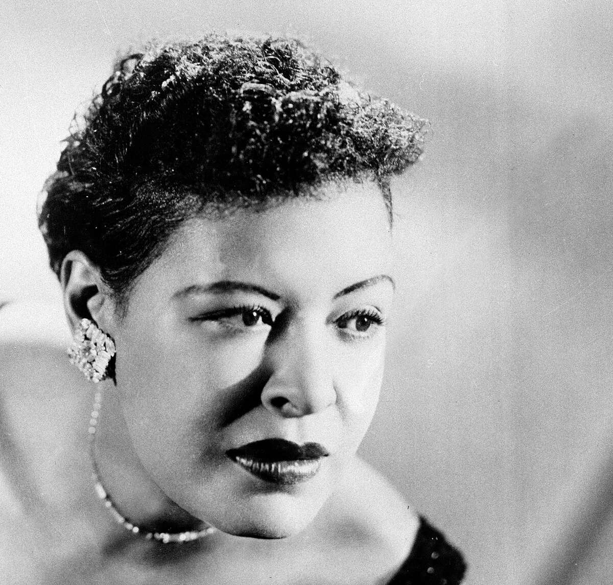FILE - This Sept. 1958 file photo shows Billie Holiday. The Apollo Theater is planning events to commemorate the 100th birthday of Holiday. The legendary American jazz vocalist was born on April 17, 1915 and died in 1959 at the age of 44. Holiday performed at least two dozen times at the Apollo. She will be inducted into its Walk of Fame on April 16, 2015. (AP Photo/FILE)