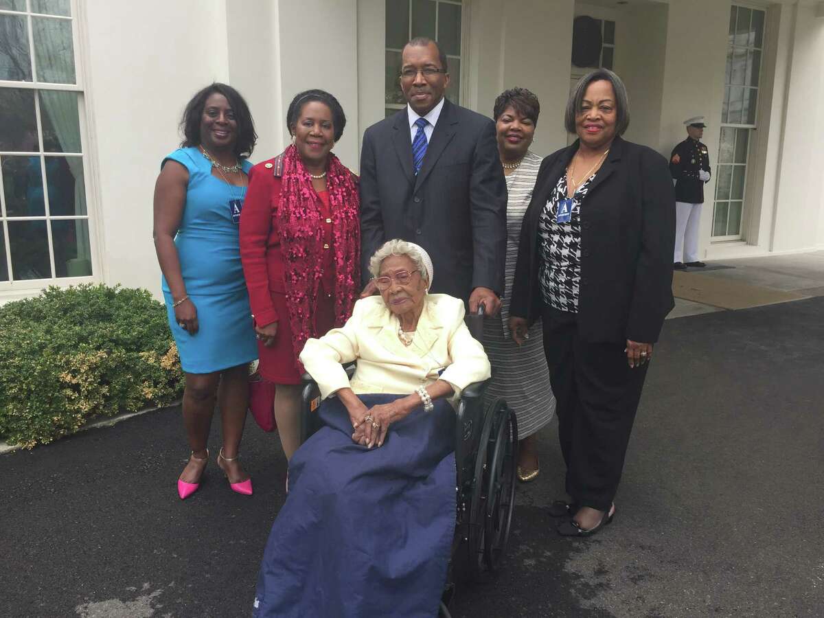 With Emma Primas at the White House were﻿, from left, Dr. June Williams Colman﻿, Rep. Sheila Jackson Lee, the Rev. John Fields, her granddaughter Laura Mickey and Edna Griggs, CEO of Acres of Angels.