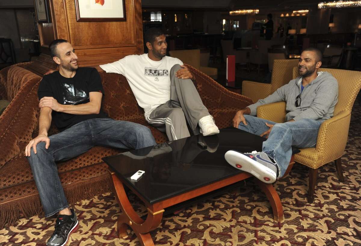 San Antonio Spurs trio of Stars, from left, Manu Ginobili, Tim Duncan and Tony Parker, speak with the Express-News at the Four Seasons Hotel in Houston on Wednesday, Oct. 6, 2010. BILLY CALZADA / gcalzada@express-news.net