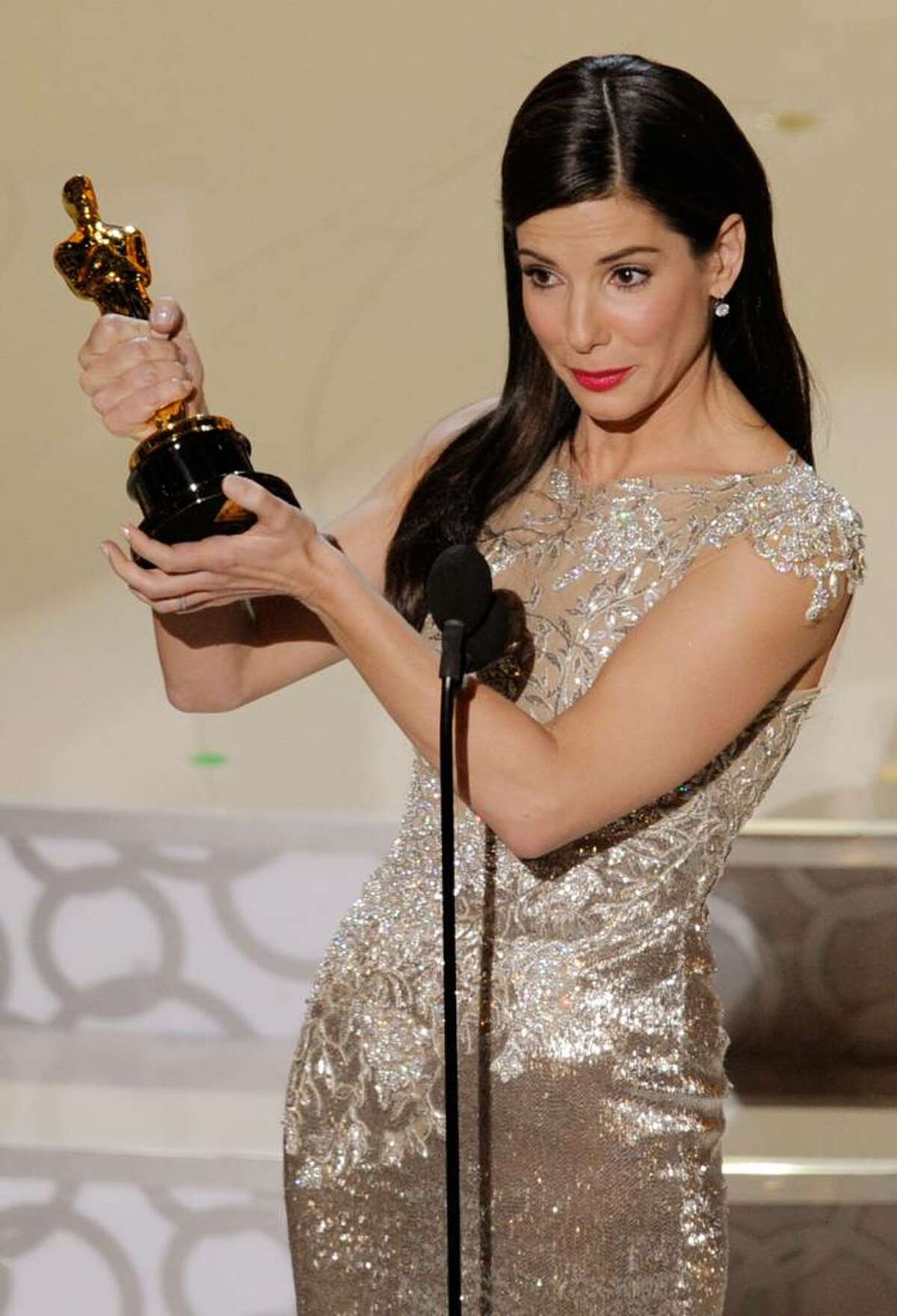HOLLYWOOD - MARCH 07: Actress Sandra Bullock accepts Best Actress award for "The Blind Side" onstage during the 82nd Annual Academy Awards held at Kodak Theatre on March 7, 2010 in Hollywood, California. (Photo by Kevin Winter/Getty Images) *** Local Caption *** Sandra Bullock