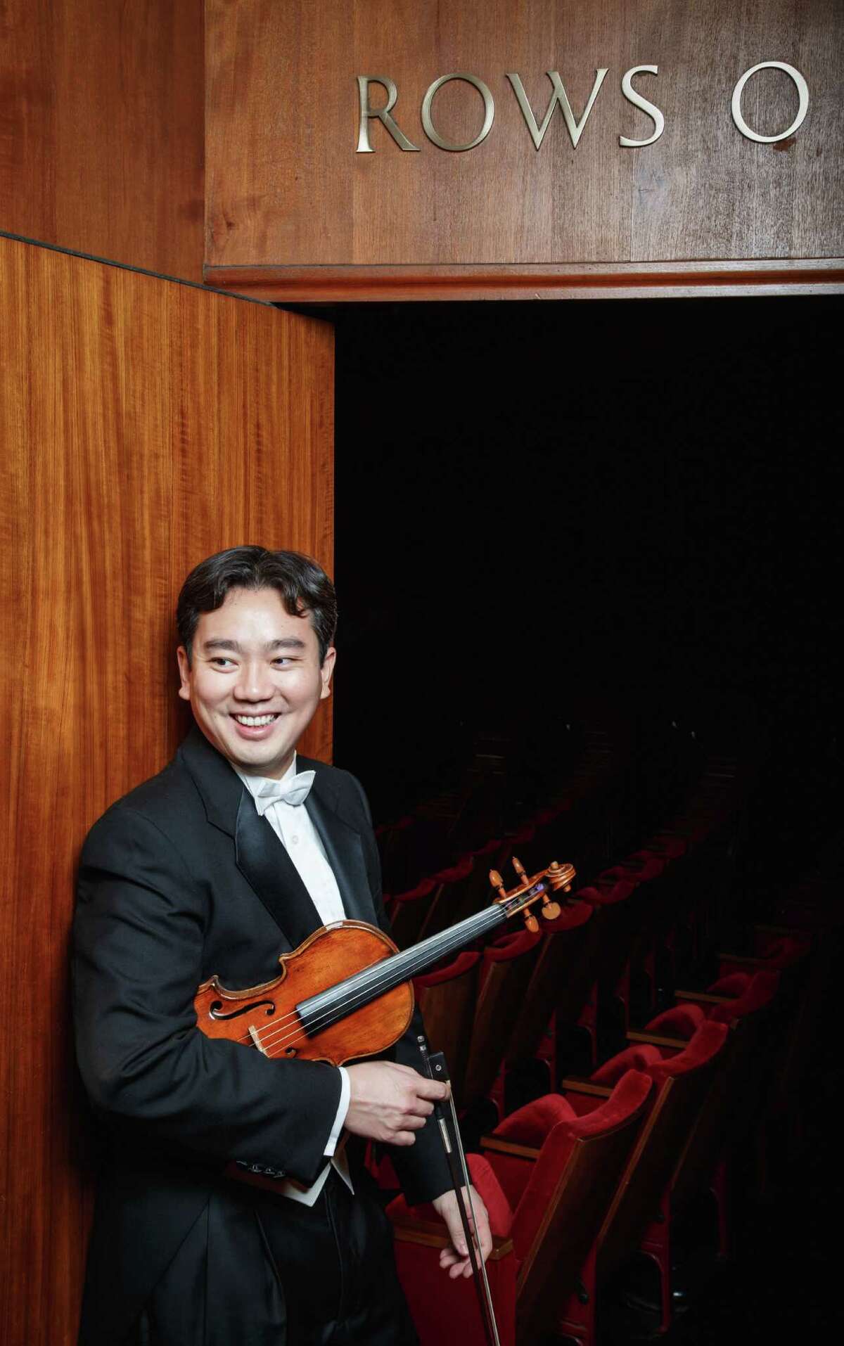 Houston Symphony musician Frank Huang (violin) poses for a photo, Wednesday, Dec. 5, 2012, in Houston. ( Michael Paulsen / Houston Chronicle )
