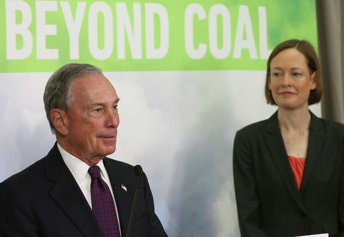 Former New York City Mayor Michael Bloomberg discusses his donation to the Sierra Club with Mary Anne Hitt, director of the group’s Beyond Coal Campaign, during a news conference.