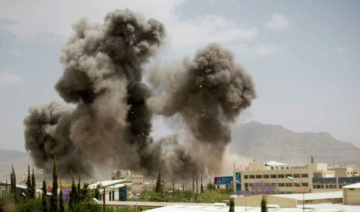 Smoke billows from a Saudi-led air strike on Sanaa, Yemen.