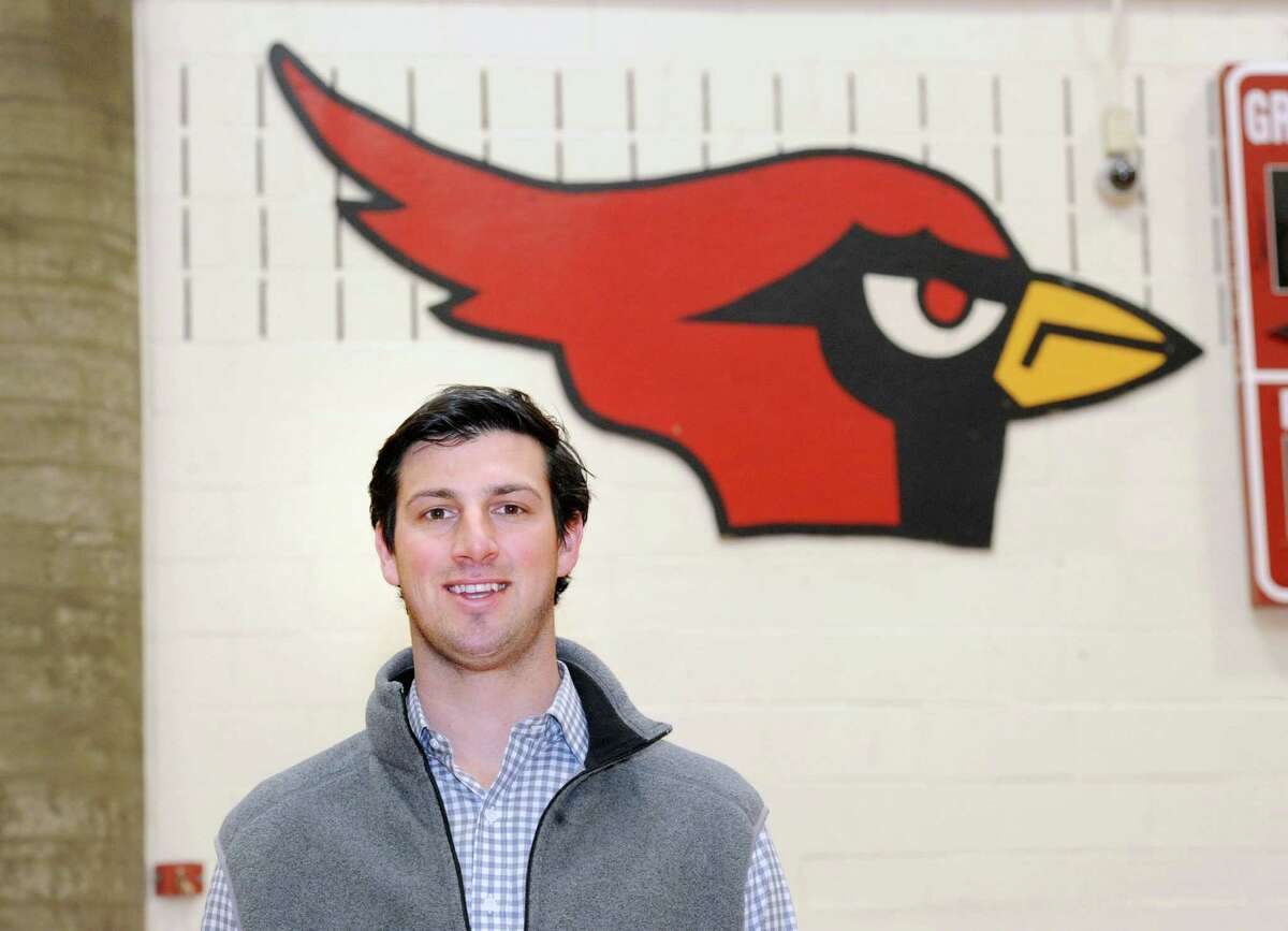 John Marinelli was named the new Greenwich High School football coach during an announcement at the school in Greenwich, Conn., Wednesday, April 8, 2015. Marinelli is the son of New Canaan High School football coach, Lou Marinelli. John Marinelli served as an assistant football coach at New Canaan High School under his father.
