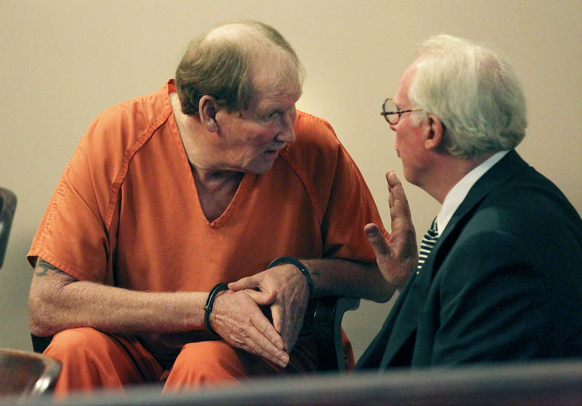 Donald Huff (left) talks with his attorney Ronald Guyer before Judge Sid Harle in the 226th State District Court sentenced Huff to 45 years in prison for felony murder in the August 2009 death of his girlfriend Arlene Harding-Watts while driving intoxicated on a motorcycle. (Kin Man Hui/San Antonio Express-News)